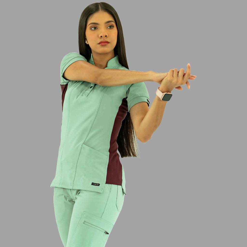 Filipina médica 930 verde menta y vino, vista frontal estirando los brazos.