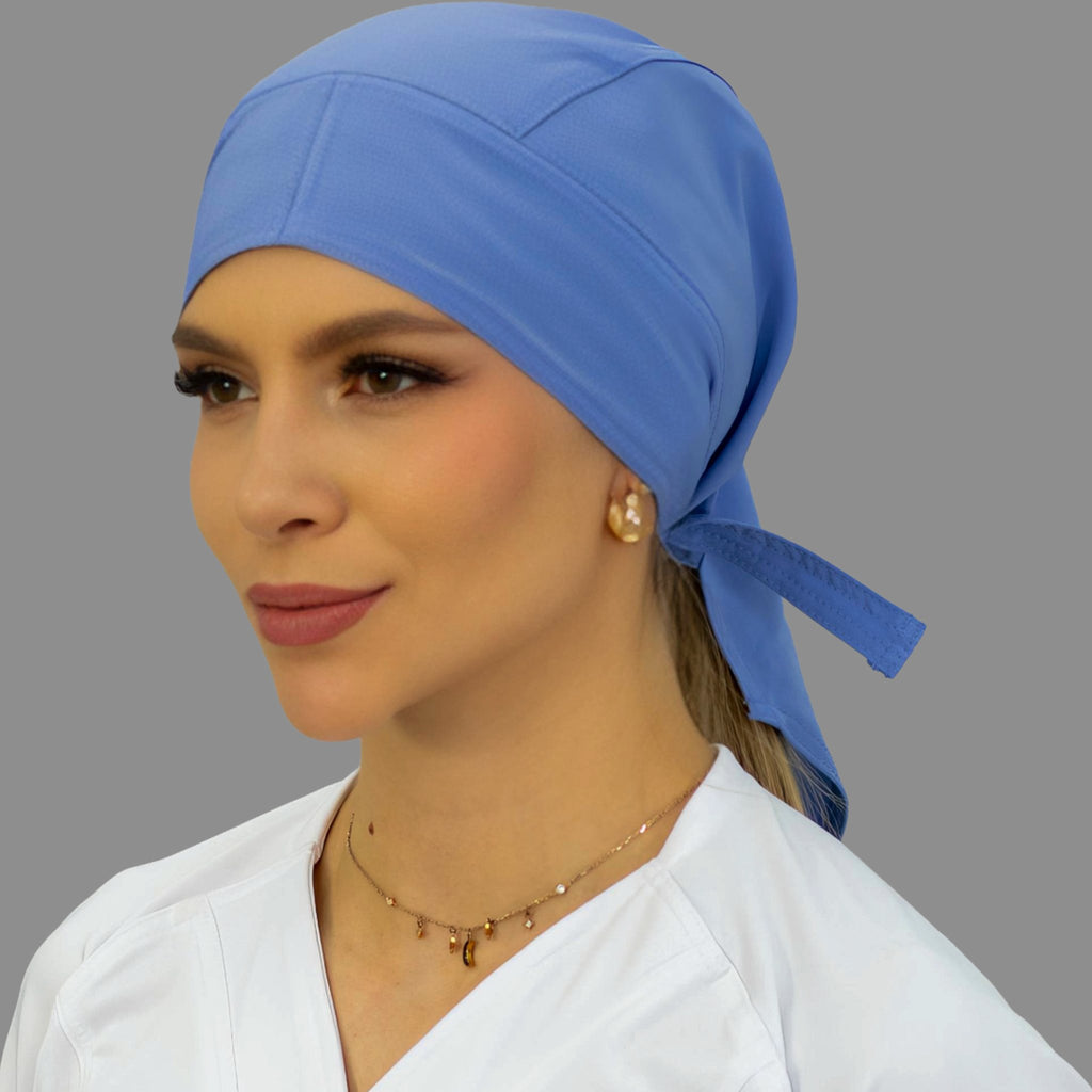 Gorro quirúrgico azul plumbago unisex Fourways vista lateral con ajuste posterior