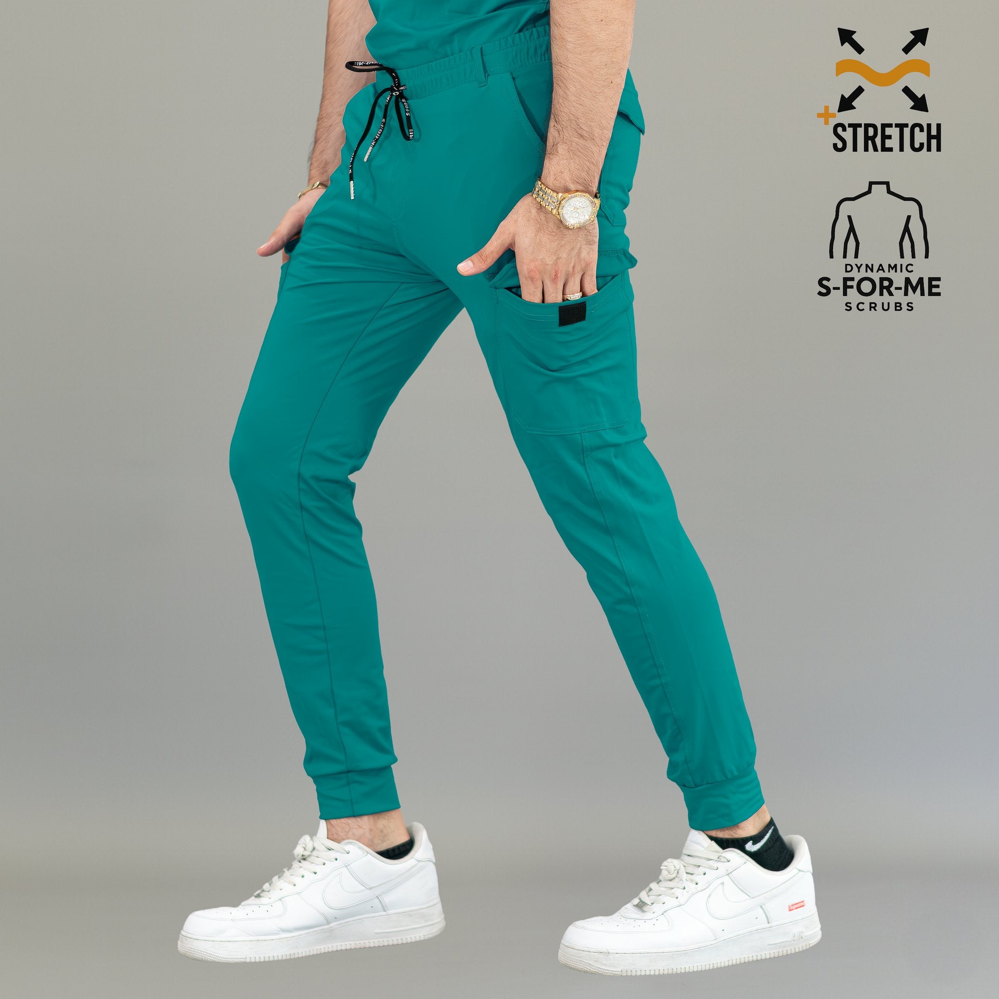 Pantalón jogger quirúrgico hombre verde teal con corte slim y bolsillos laterales