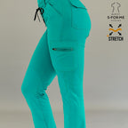 Acercamiento lateral de pantalón médico 930 color teal mostrando el detalle del bolsillo.