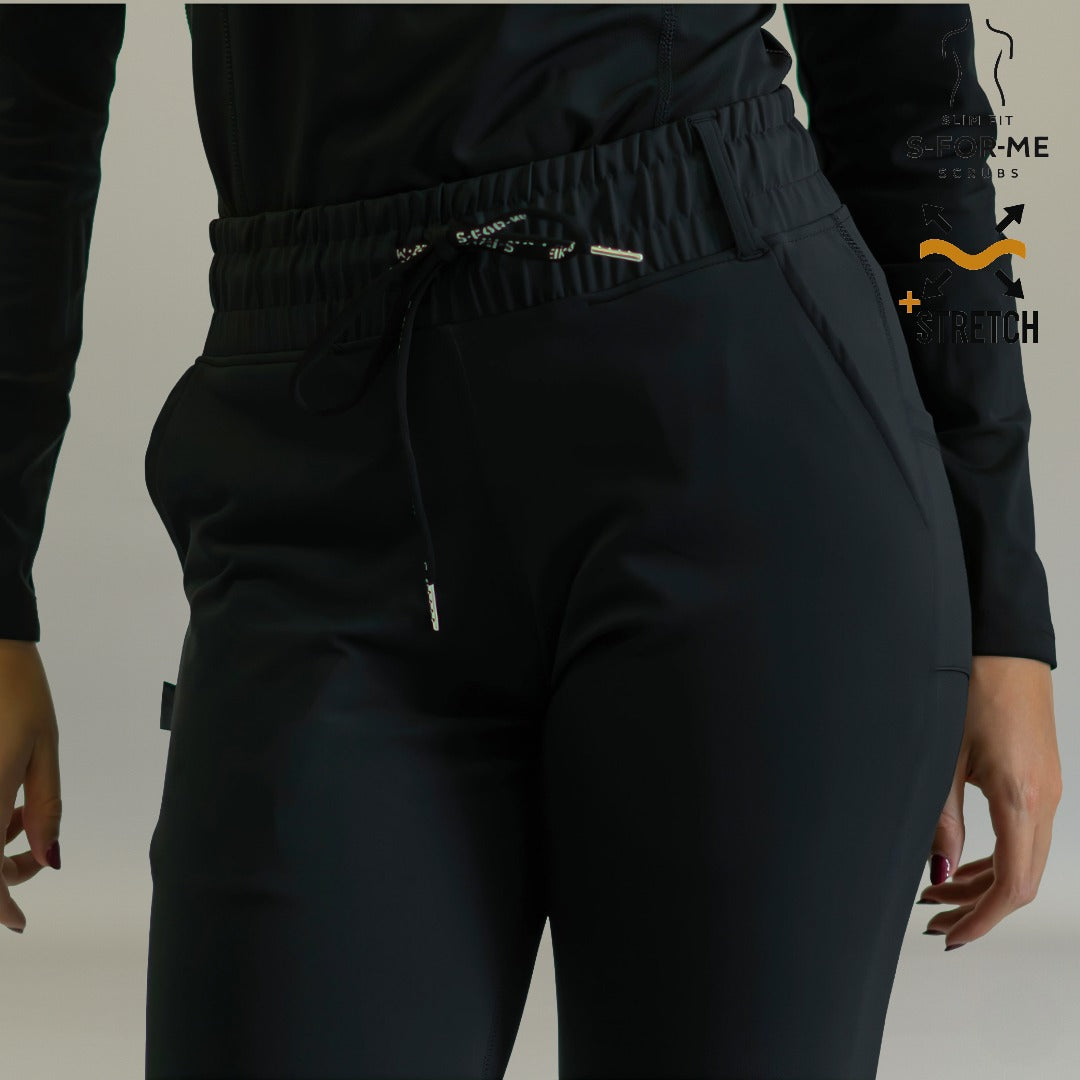 Uniforme médico mujer 915 Negro — pantalón flare vista tres cuartos lateral