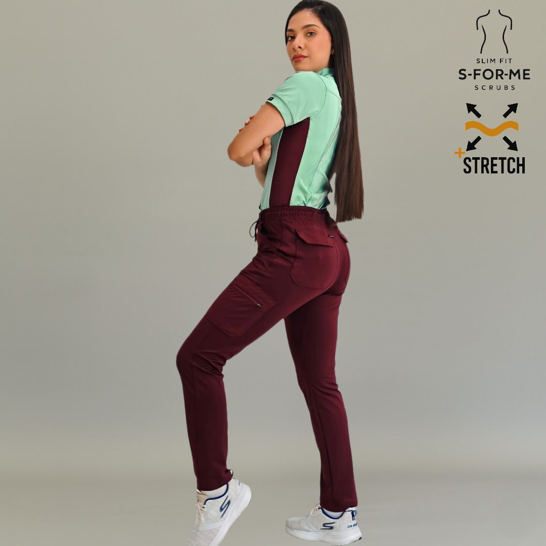 Vista de cuerpo entero con pantalón médico 930 color vino y filipina.