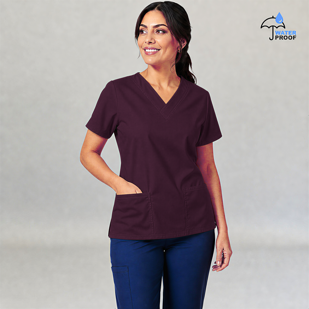 Filipina médica 502 vino cherry para mujer, modelo con mano en el bolsillo derecho.