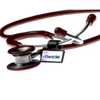 Burgundy cardiology stethoscope close-up showing dual stainless steel chestpiece and name tag